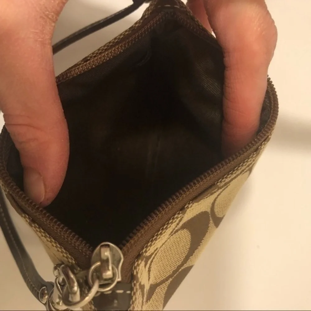 Coach brown signature striker wristlet